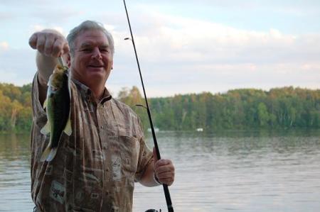 Dad with his catch on Lake Minerva